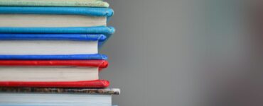 shallow focus photography of books